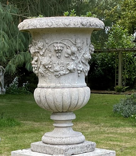 Lot 841 - A reconstituted stone classical style garden urn, late 20th century