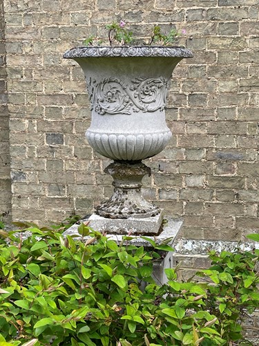 Lot 825 - A classical style reconstituted stone garden urn, late 20th century