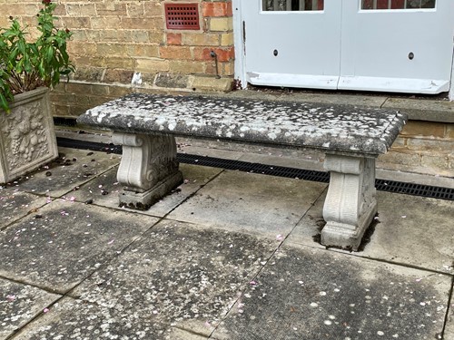 Lot 443 - A scroll support reconstituted stone garden bench