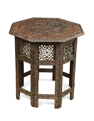 Lot 646 - An Indian carved hardwood folding table, circa 1910