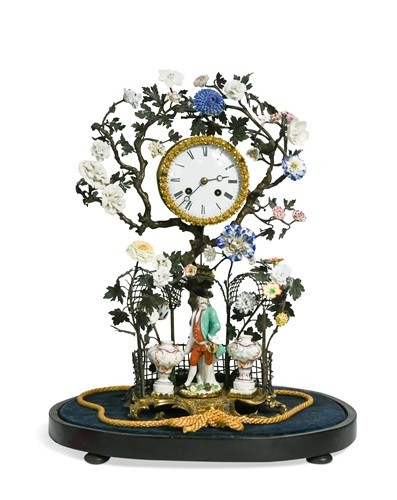 Lot 617 - A German porcelain and gilt metal clock, 19th century