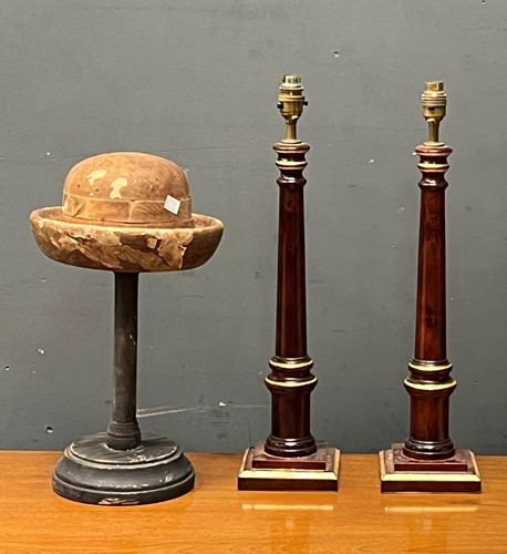Lot 629 - A pair of turned wood and parcel gilt columnar...