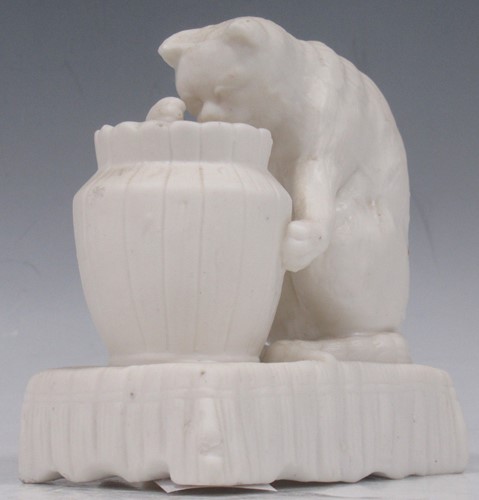 Lot 45 - A Parian spill vase in the form of a cat with...