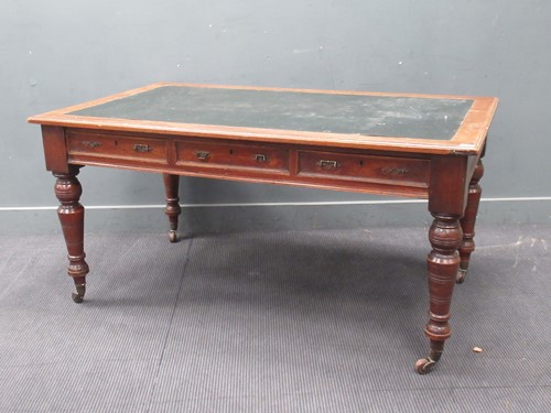 Lot 621 - An Edwardian mahogany library table, rounded...