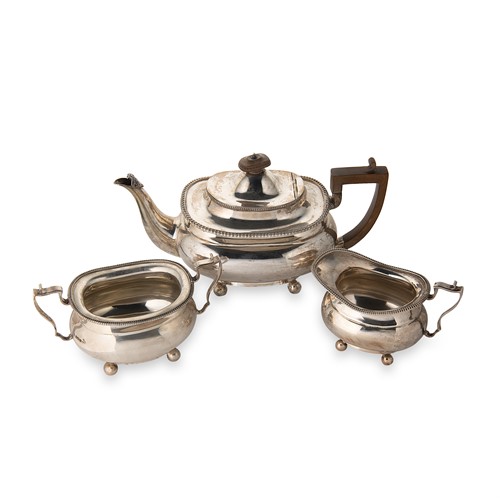 Lot 414 - A George V silver three-piece tea set
