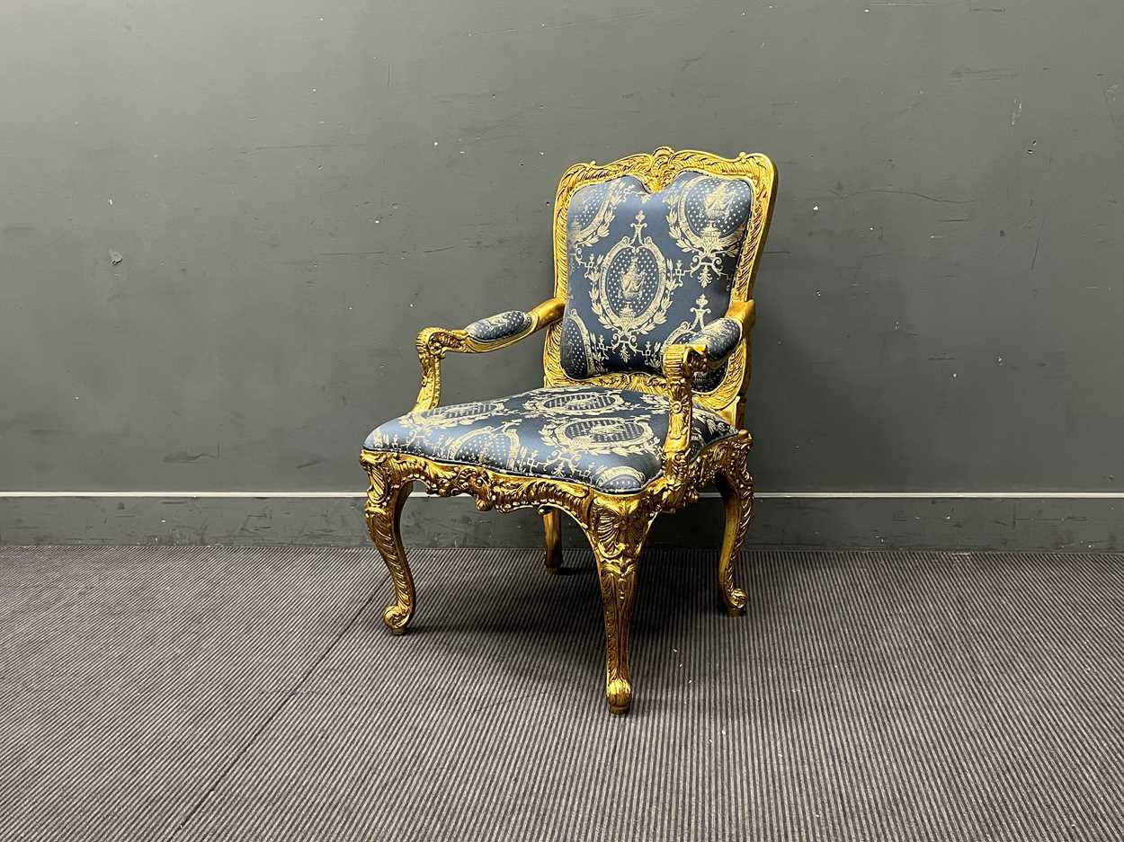 Lot 550 - A Louis XV style giltwood fauteuil, the frame...