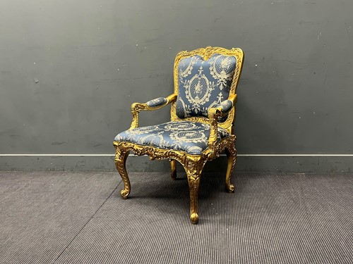 Lot 464 - A Louis XV style giltwood fauteuil, the frame...