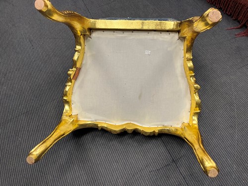 Lot 550 - A Louis XV style giltwood fauteuil, the frame...