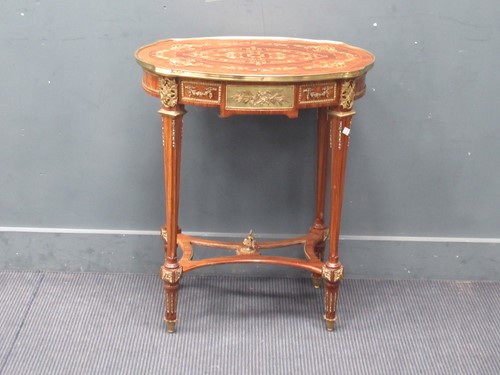 Lot 569 - A Louis XVI style gilt metal mounted shaped...