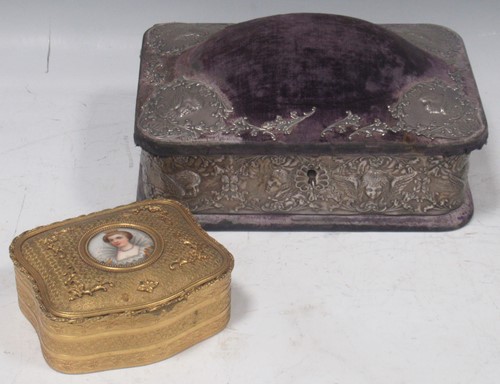 Lot 170 - A gilt metal trinket box, the cover inset with...