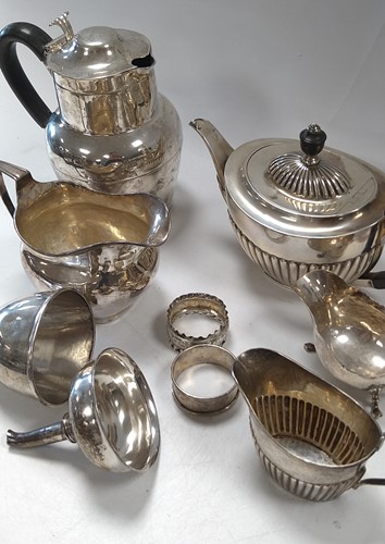 Lot 290 - A quantity of silverware including, teapot,...