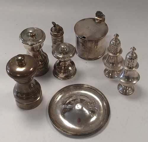 Lot 283 - Three silver pepper grinders, three...