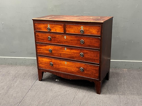 Lot 545 - A 19th century mahogany chest of two short...
