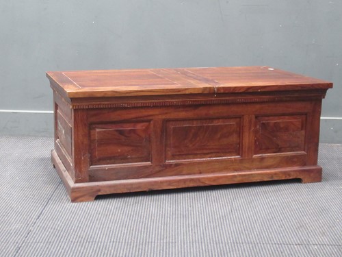 Lot 469 - An Eastern hard wood chest, modern, with twin...