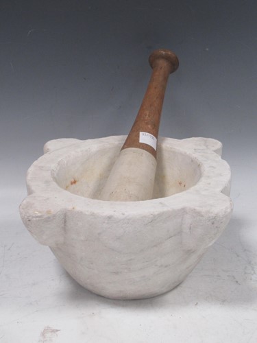 Lot 64 - A large scale honed marble pestle and mortar....