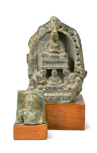 Lot 86 - A Gandhara carved grey schist fragment of Shakyamuni seated in meditation, 2-4th century AD