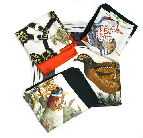 Lot 168 - A collection of four designer silk scarves