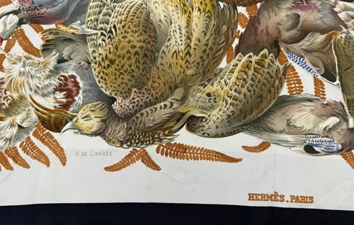 Lot 168 - A collection of four designer silk scarves