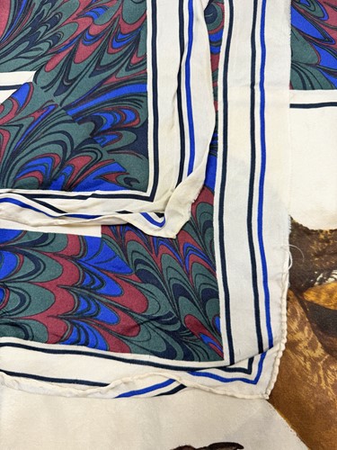 Lot 168 - A collection of four designer silk scarves