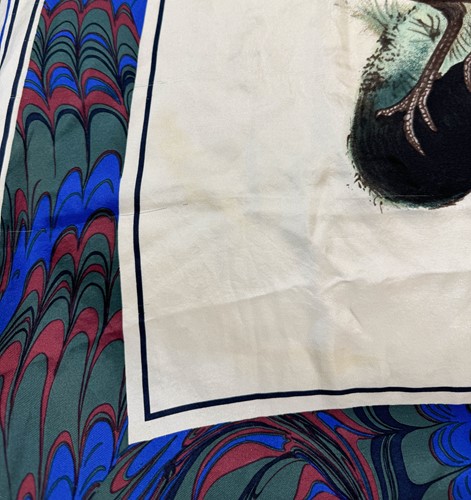 Lot 168 - A collection of four designer silk scarves