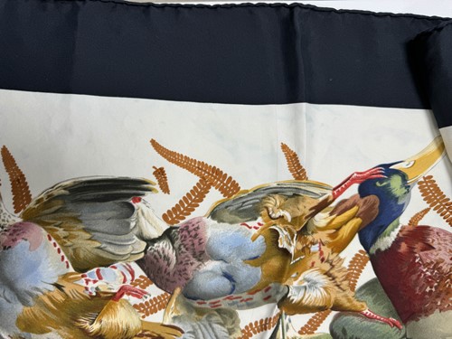 Lot 168 - A collection of four designer silk scarves