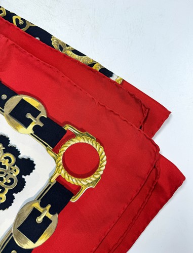 Lot 168 - A collection of four designer silk scarves