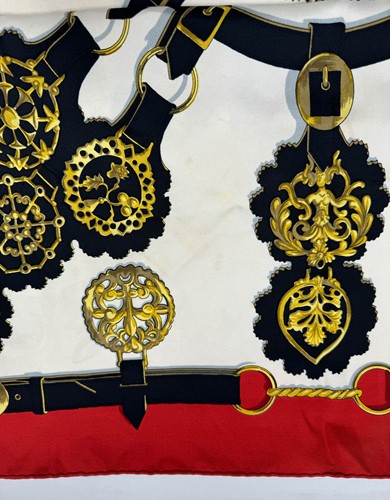 Lot 168 - A collection of four designer silk scarves