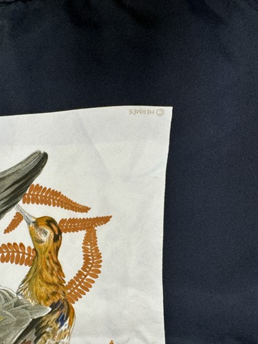 Lot 168 - A collection of four designer silk scarves