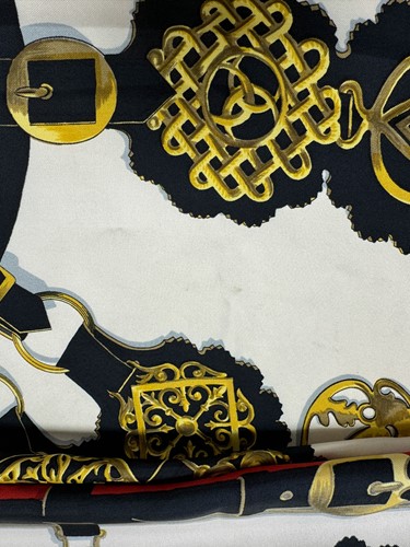 Lot 168 - A collection of four designer silk scarves