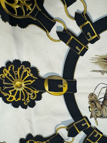 Lot 168 - A collection of four designer silk scarves