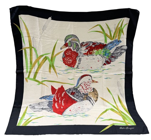 Lot 168 - A collection of four designer silk scarves