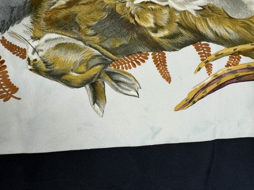Lot 168 - A collection of four designer silk scarves