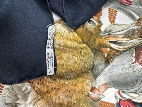 Lot 168 - A collection of four designer silk scarves