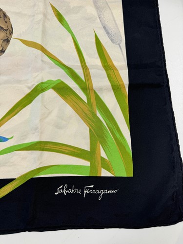 Lot 168 - A collection of four designer silk scarves