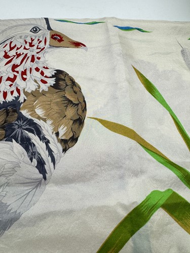 Lot 168 - A collection of four designer silk scarves