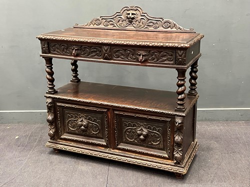 Lot 592 - A Victorian carved oak buffet cupboard with 2...
