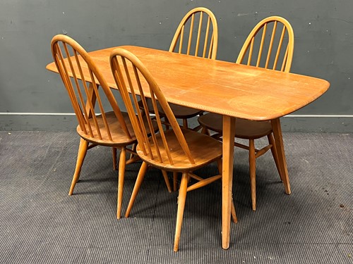 Lot 622 - An elm and beech Ercol style table 72 x 152 x...