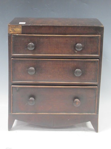 Lot 162 - A miniature 19th century chest of drawers,...