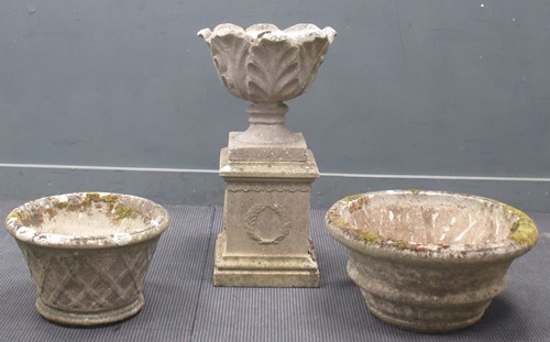 Lot 691 - A moulded leaf body urn on plinth 80cm high...
