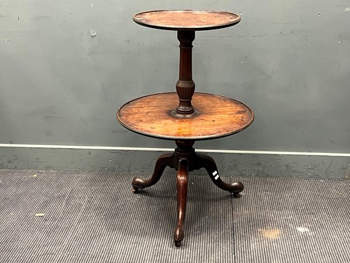Lot 587 - A 19th century mahogany two tier dumb waiter...
