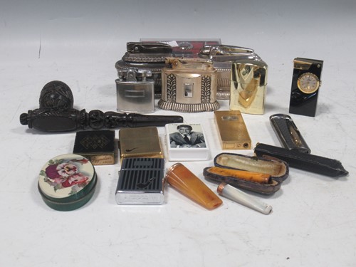 Lot 178 - A box of assorted smoking equipment to include...