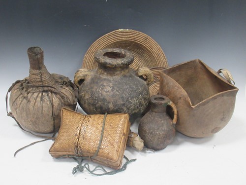 Lot 133 - A collection of African tribal items to...