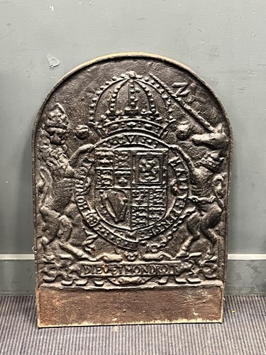 Lot 336 - A cast iron fire back, early 20th century, of...