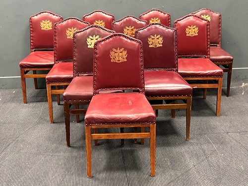 Lot 610 - A set of ten leather upholstered beech framed...