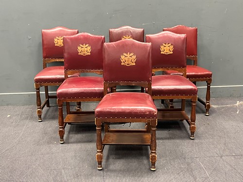 Lot 597 - A set of six leather upholstered oak framed...
