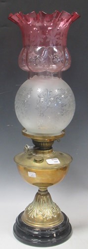 Lot 166 - A late Victorian brass oil lamp with etched...