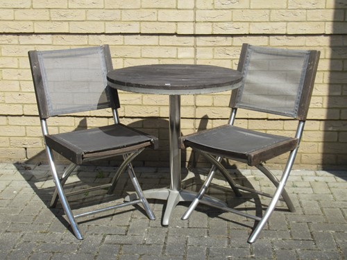 Lot 488 - A John Lewis garden table with wooden top and...