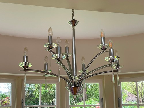 Lot 481 - A modern design chrome finish nine arm ceiling...