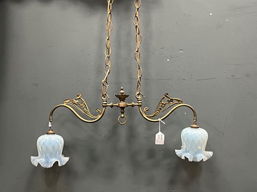 Lot 679 - A Victorian brass ceiling light, the twin swan...