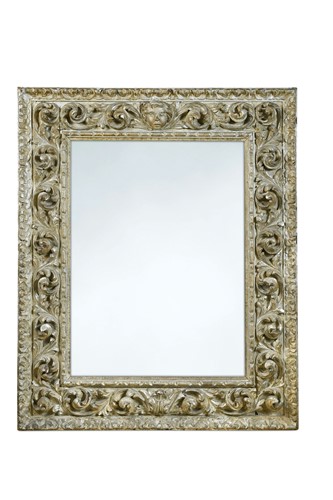 Lot 100 - A carved and silvered wood wall mirror, 19th century